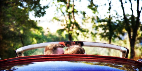 Bride and Groom in rearview mirror